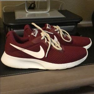 Maroon Nike tanjun shoes